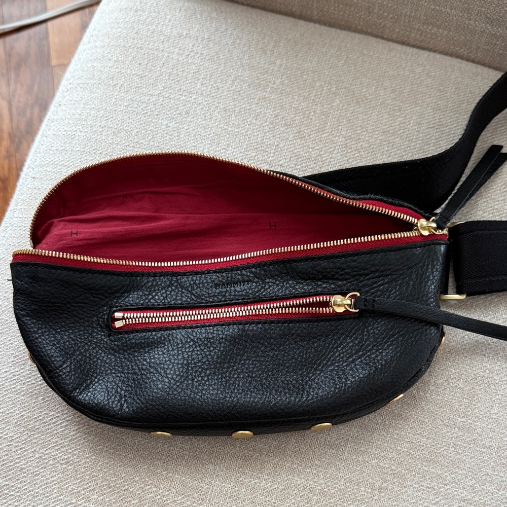 Elegant Black Crossbody Bag with Red Interior